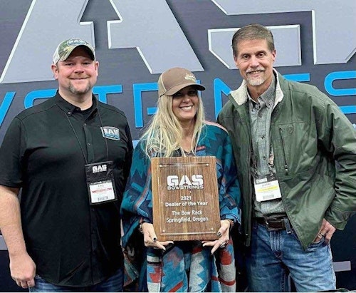 GAS Bowstrings President Eric Griggs (left) presents his company’s 2021 Dealer of the Year award to Lisa and Wayne Endicott from The Bow Rack.